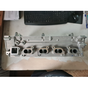 Головка блока ЗМЗ-409051-00 (3-ёх опорная с клапанами, прокладкой и крепежом