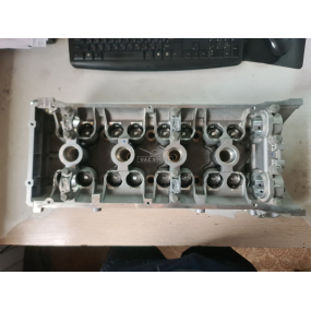 Головка блока ЗМЗ-409051-00 (3-ёх опорная с клапанами, прокладкой и крепежом
